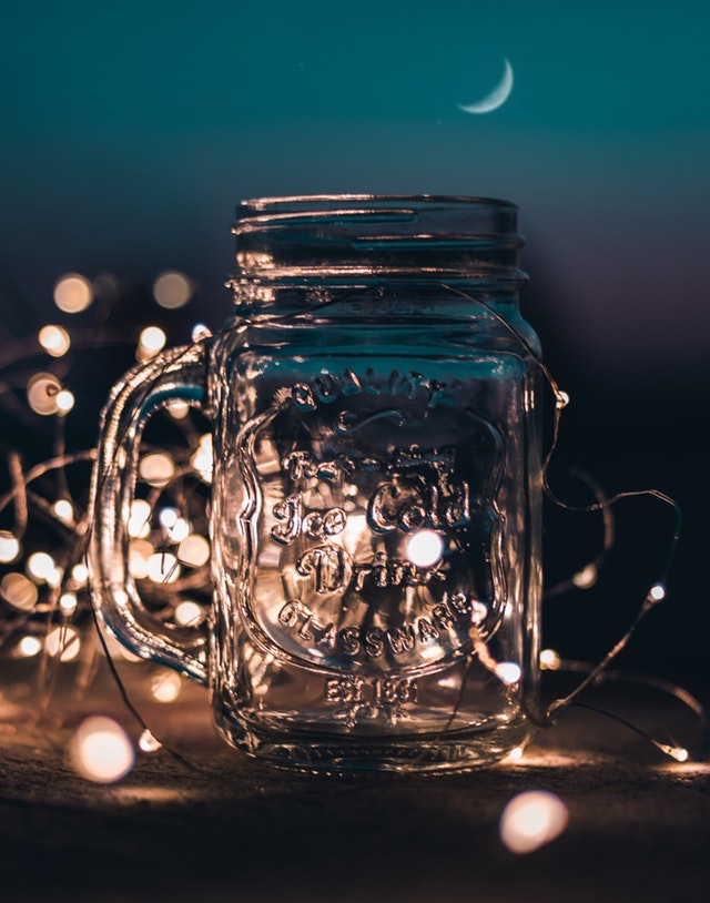 Mug with Fairy Lights on Background